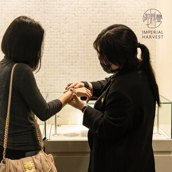 Clients trying on the new Imperial Harvest Emblem