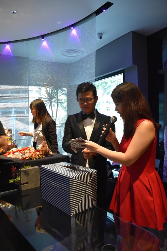 Master David Goh picking out lucky draw winners